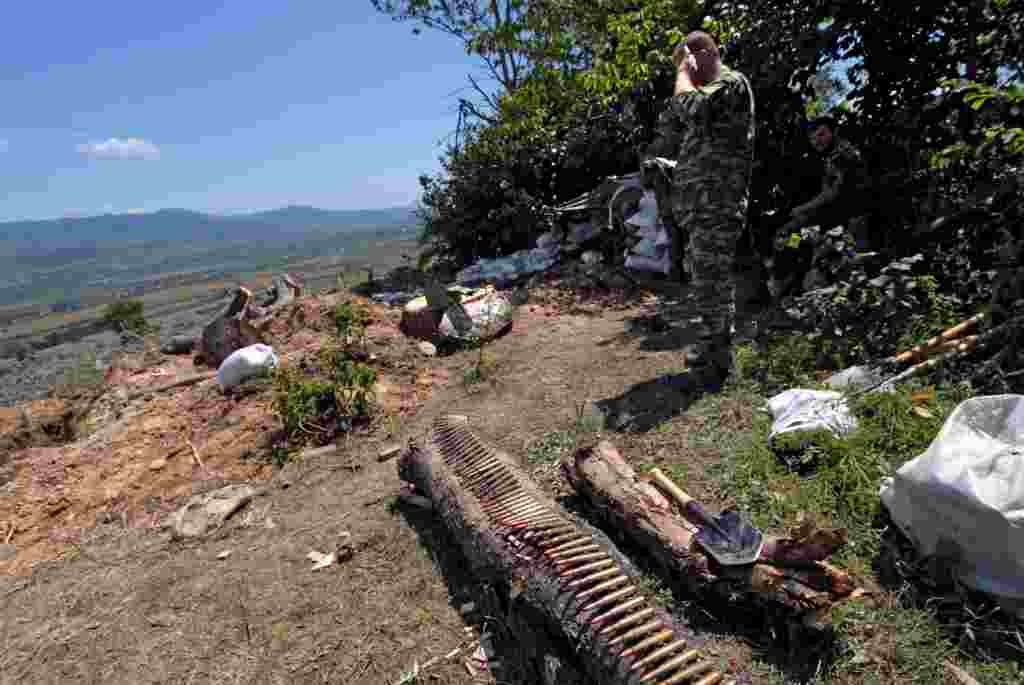 South Ossetian fighters take up positions near Tskhinvali on August 8.