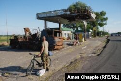 A destroyed gas station north of Kyiv.