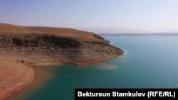 The Kempir-Abad reservoir is a vital regional water source located in the fertile Ferghana Valley.