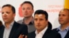 Macedonian Social Democratic leader Zoran Zaev (second from right) and other members of his party injured in the April 27 violence speak to reporters in Skopje on April 28.