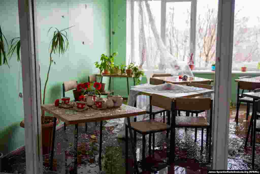 The canteen in the cardiology department, strewn with shattered glass.