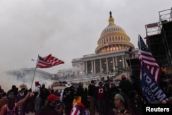 Kremlin-aligned commentators suggested that the United States was getting its own "color revolution" following this week's violence at the U.S. capitol.