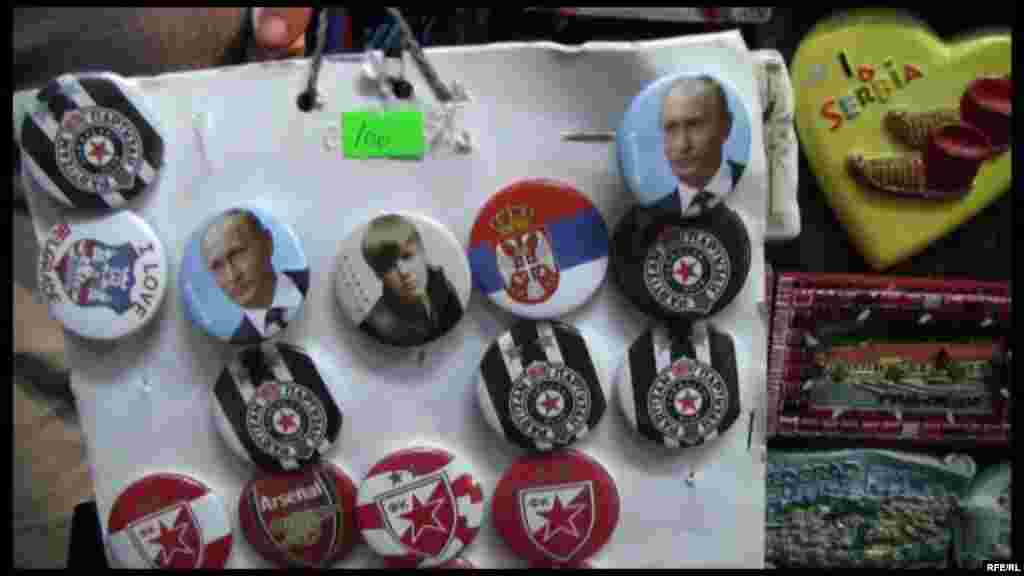 Vladimir Putin or Justin Bieber? Or maybe Arsenal or Partizan Belgrade? Take your pick from the souvenir badges. 