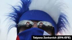 A fan in Russian colors at the Fan Fest Zone in Samara.