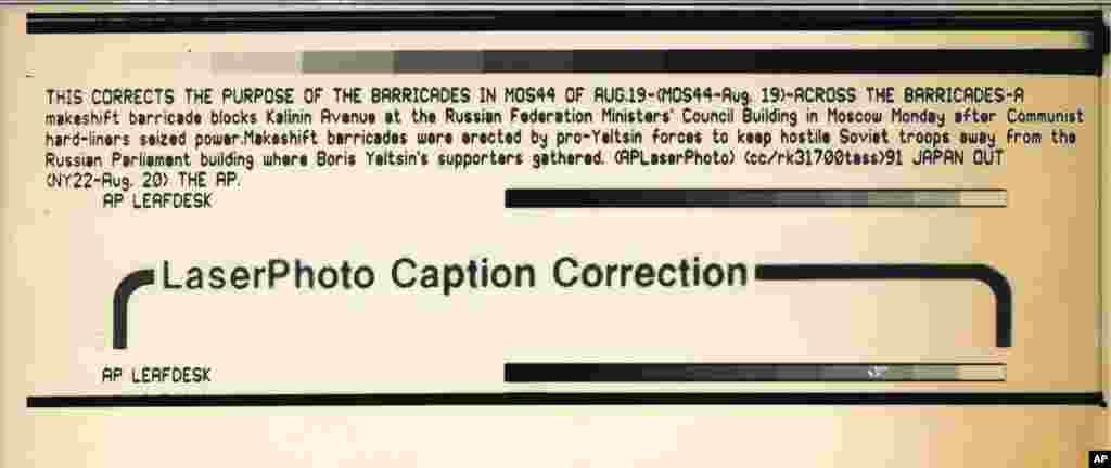 An AP photo caption correction on August 19 was issued to clarify that barricades around the Russian parliament building were being erected by supporters of Gorbachev and Yeltsin.&nbsp;