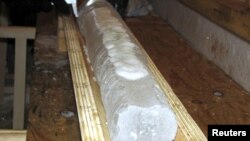 An ice core is seen in April 2010 at the Russian camp above Lake Vostok.