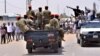 Sudan Defense Minister: Longtime Leader Detained, Army Seizes Power