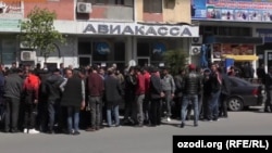 Several people said they had been waiting at the central air ticket office for a week.