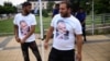 Supporters wearing T-shirts with pictures of former Bulgarian Prime Minister Boyko Borisov await a preelection rally in the city of Kardzhali on July 5.