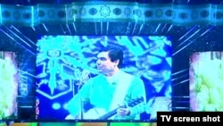 Turkmen President Gurbanguly Berdymukhammedov performs on his birthday in Ashgabat on June 29.