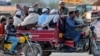 Worshippers leave the religious gathering in Lahore on March 13.