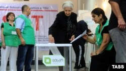 A woman casts her ballot in the capital, Tbilisi, during parliament elections in Georgia in 2012.