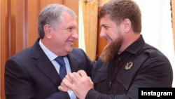 Rosneft boss Igor Sechin (left) and Chechen leader Ramzan Kadyrov pose during a meeting in April.