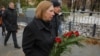 The U.S. ambassador to Russia, Lynne Tracy, lays flowers at the Solovetsky Stone to remember the victims of political repression, in Moscow on October 29.
