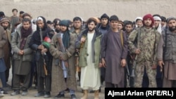 Civilians and former mujahedin volunteers mobilized against the Taliban onslaught in the northern Afghan province of Kunduz in May.