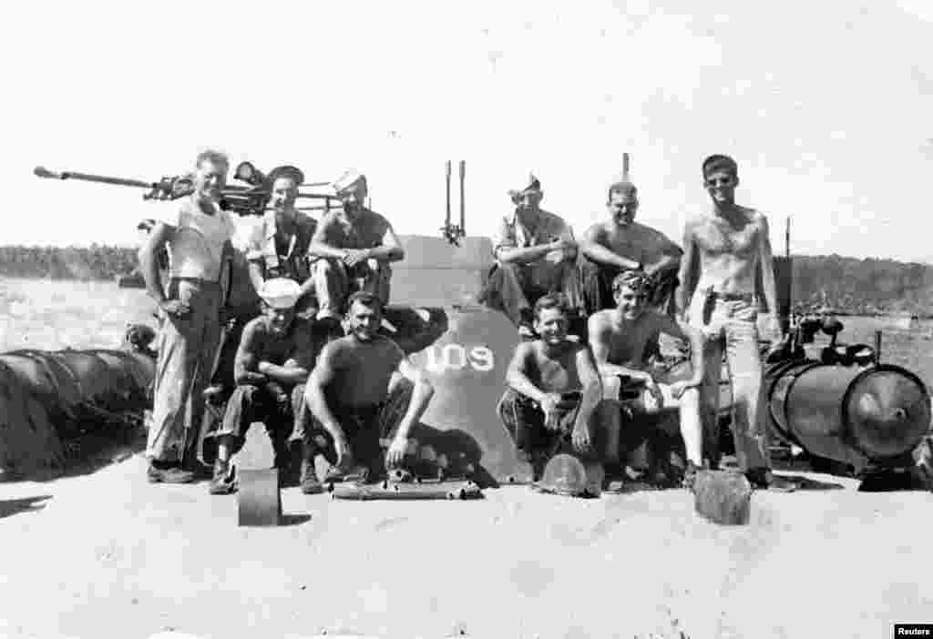 The crew of the patrol torpedo boat PT-109, including U.S. Navy Lt. John F. Kennedy (right), seen here near Guadalcanal in the southwestern Pacific in July 1943.