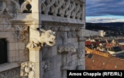 A cheerful gargoyle on the spire of the Matthias Church