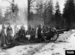 Red Army artillery works against the fort from the shores of the Gulf of Finland as the attack on Kronstadt begins.