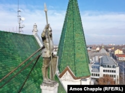 Roland, a legendary eighth-century knight, stands atop the mayor's building in Ujpest, a suburb in northern Budapest.