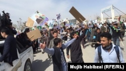 Supporters of Afghan Vice President Abdul Rashid Dostum rally in Mazar-e Sharif.