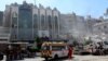 An ambulance is parked outside the Iranian consulate in Damascus after a suspected Israeli strike on April 2. 