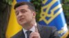 UKRAINE -- Ukrainian President Volodymyr Zelenskiy gestures during an open-air news conference, one year after his inauguration, amid the outbreak of the coronavirus disease (COVID-19) in Kyiv, May 20, 2020