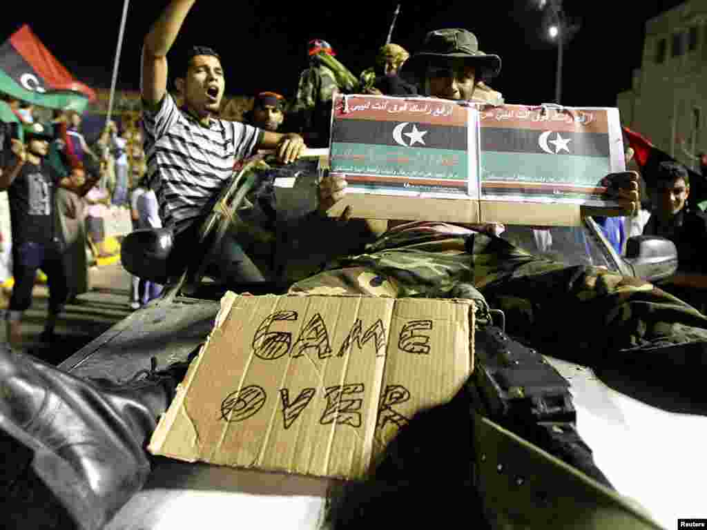 More rebel celebrations in Tripoli as it becomes increasingly clear that Qaddafi's days as Libyan leader are numbered