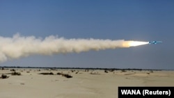 A missile is launched by Iran's military during a naval exercise in the Gulf of Oman on January 14.