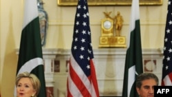 U.S. Secretary of State Hillary Clinton and Pakistani Foreign Minister Shah Mehmood Qureshi at the State Department in Washington on March 24.