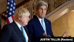 British Foreign Secretary Boris Johnson (left) and U.S. Secretary of State John Kerry in London on October 16