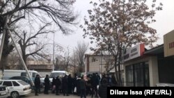 People look for their detained relatives at a detention center in Shymkent on January 10.