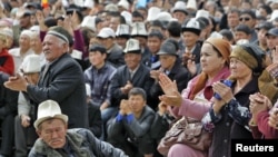 Bakiev's supporters gather to hear him speak on April 13 - two days before he fled the country.