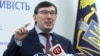 Ukrainian Prosecutor-General Yuriy Lutsenko speaks at a press conference in Kyiv on March 7.