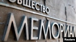 The sign outside the headquarters of the Memorial rights group in Moscow.