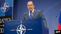 Russian Foreign Minister Sergei Lavrov gives a press conference following a meeting of NATO ministers at the alliance's headquarters in Brussels in December 2013.