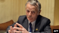 "The last time I saw my wife we had to meet in a neutral zone," says Crimean leader Mustafa Dzhemilev (pictured) "I couldn't see my family and was isolated during the Soviet era as well, and now history is repeating itself to an extent."