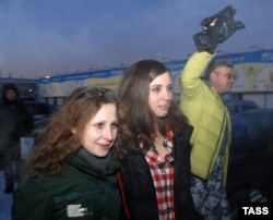 Pussy Riot members Maria Alyokhina (left) and Nadezhda Tolokonnikova in December 2013, shortly after their release from prison.