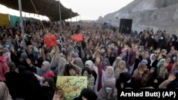 Members of the Shi'ite Hazara community chant slogans during a sit-in protest against the killing of coal miner in Balochistan by the Islamic State-Khorasan militants in January 2021.