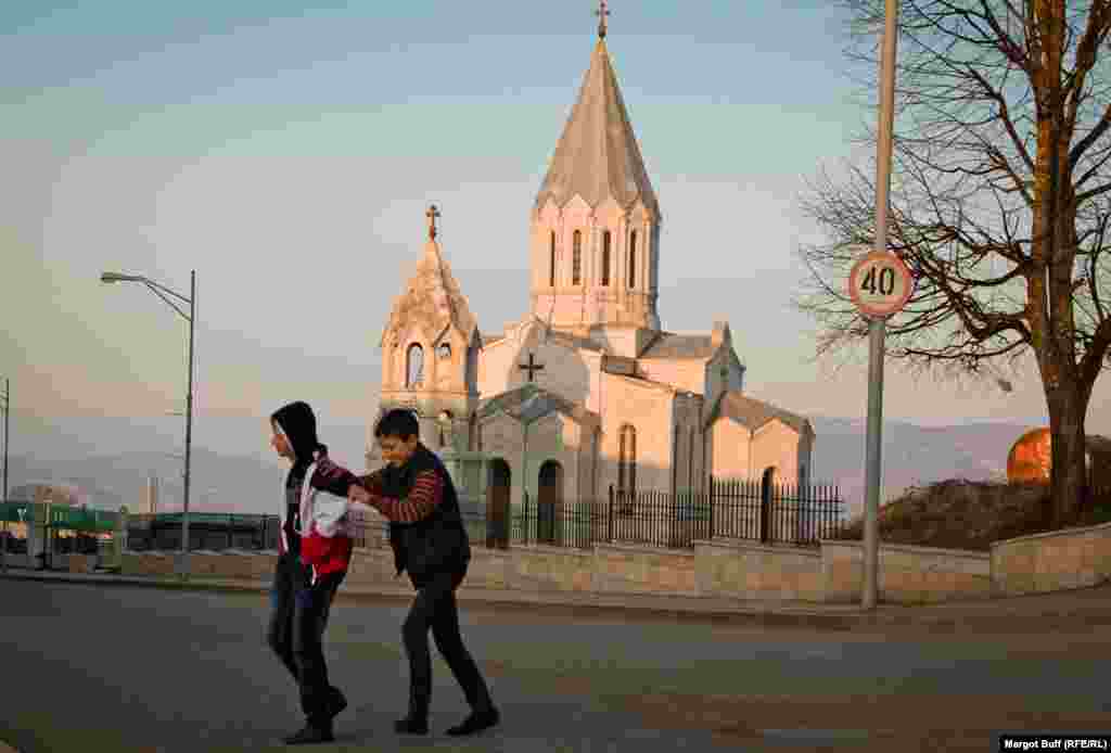 Children play in front of Ghazanchetsots Cathedral, completely reconstructed after the war, in the town of Shusha. Known as Shushi to its Armenian residents, the town was inhabited mainly by Azerbaijanis until the end of the war.