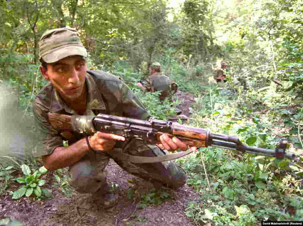 Georgian soldiers training near the Pankisi Gorge in 2002. The gorge was notorious at the time for harboring often foreign-born Islamic militants. Georgian security forces reportedly captured &ldquo;more than a dozen Arab militants&rdquo; in Pankisi in 2002.