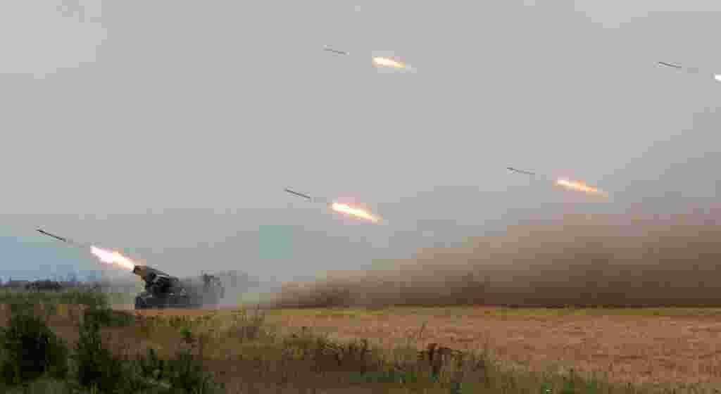 Georgian forces fire rockets at separatist South Ossetian troops close to the region&#39;s capital, Tskhinvali, on August 8. Georgian officials said the country was taking measures to prevent Russian &quot;mercenaries&quot; from infiltrating the country.