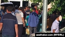 Residents of Turkmenistan, such as these people waiting outside a shop in Ashgabat, have suffered from shortages for more than three years.