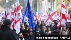 Protesters rally in Tbilisi in support of ex-President Mikheil Saakashvili on November 19. 