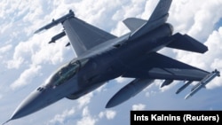 A U.S. Air Force F-16 fighter takes part in an exercise over Estonia in June 2018.