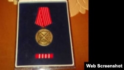 A picture posted on Dalibor Jaukovic's Facebook account showing a 1999 Kosovo war medal from then Yugoslav President Slobodan Milosevic.