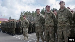 U.S. and Ukrainian National Guard soldiers during the opening ceremony of joint military exercises near the western Ukrainian city of Lviv on April 20