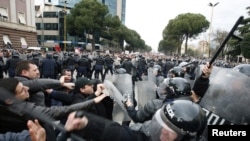 Supporters of the opposition Socialist Party clash with police during an anti-government rally in Tirana.