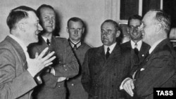 German Foreign Minister Joachim von Ribbentrop (right) is welcomed by Adolf Hitler at the Reich Chancellery in Berlin after signing the pact in Moscow on August 23-24,1939. Was Stalin justified in signing the pact, complete with secret protocol?