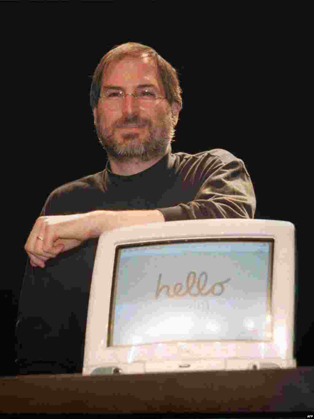 Jobs&#39; return to Apple in 1997, nearly a decade after breaking with management, rejuvenated the company. Here, Jobs introduces iMac computers at &quot;Apple Expo&quot; in Paris, France in 1998.