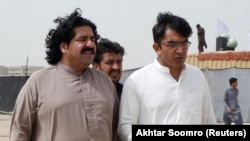 The Pakistani military said a group led by two PTM activists and lawmakers -- Ali Wazir (left) and Mohsin Dawar -- "assaulted" the checkpoint. (file photo)